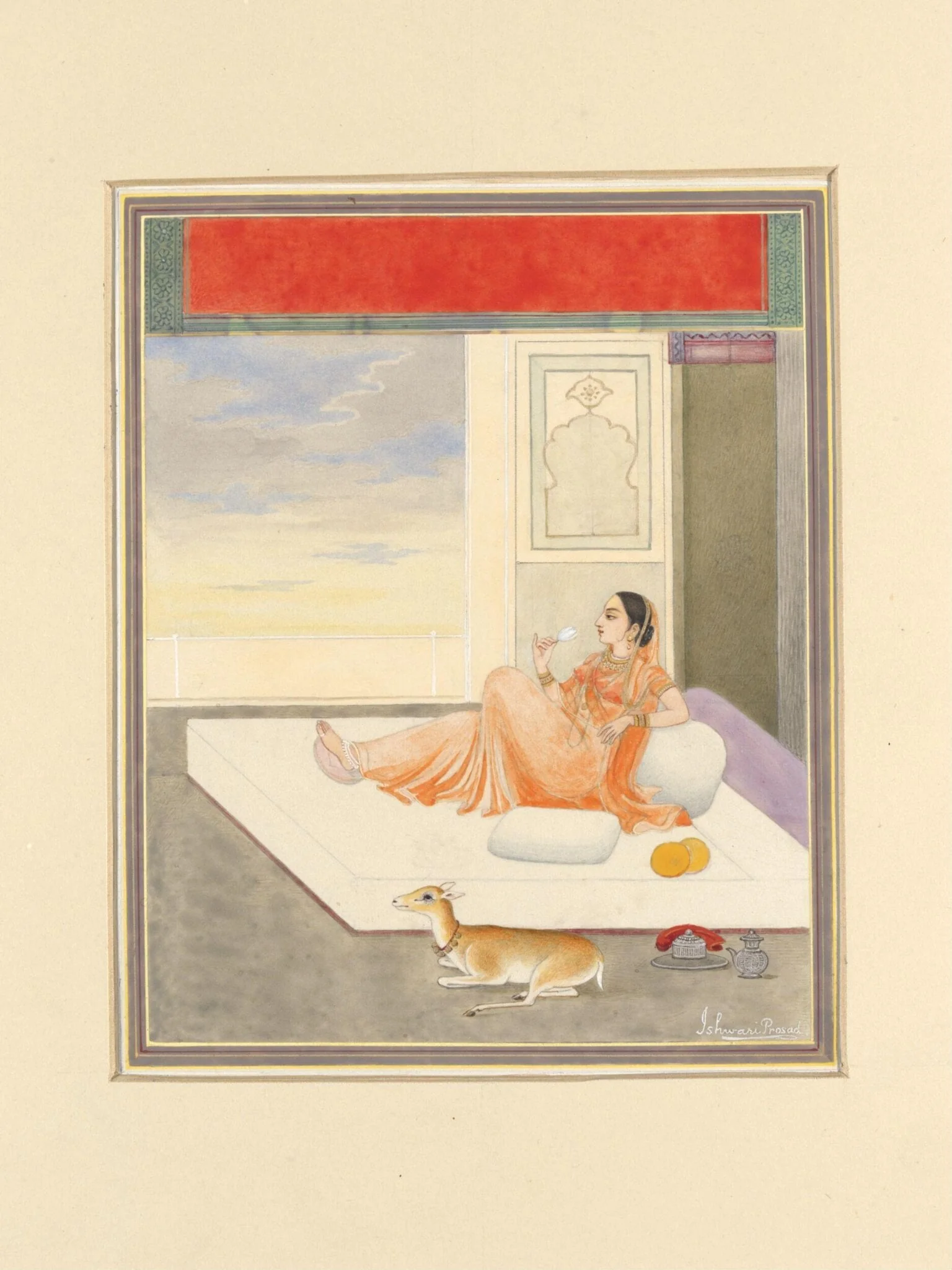 A lady lying on cushions