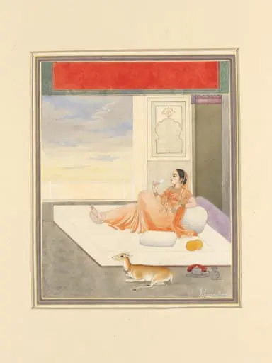 A lady lying on cushions