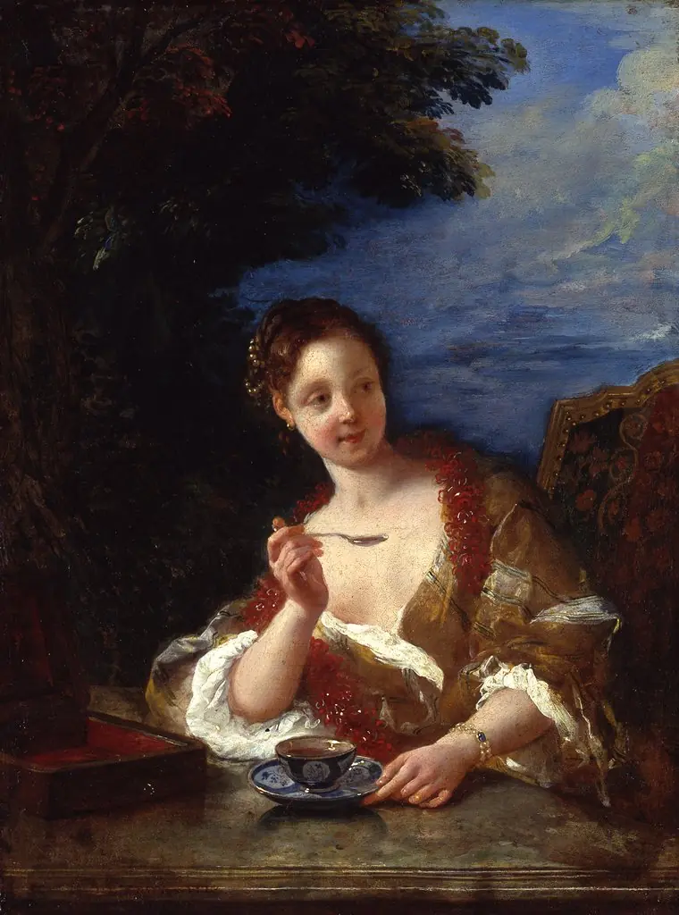 Young Woman Drinking Coffee