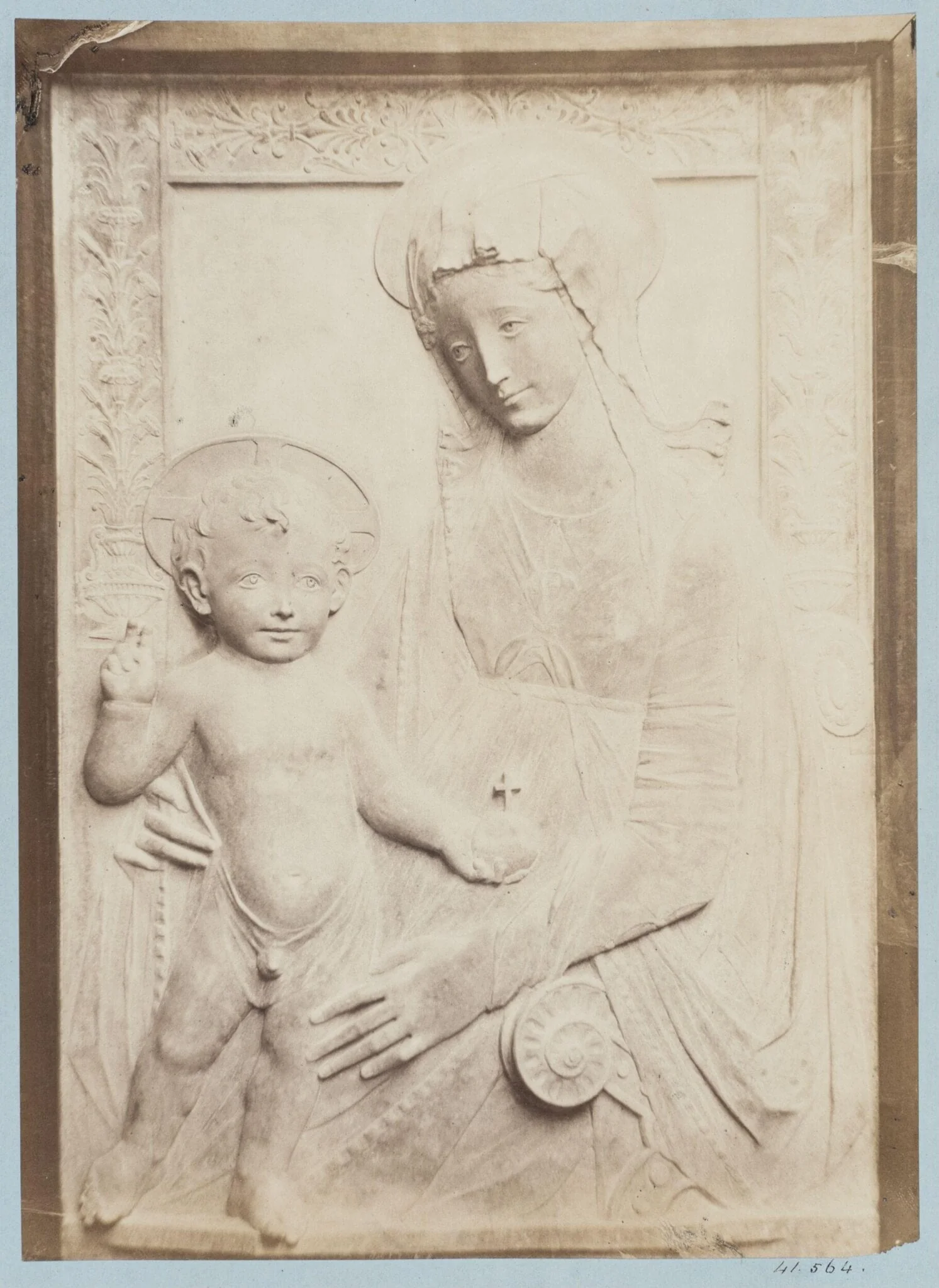 Bas-relief depicting the Virgin and Child attributed to Rosellino