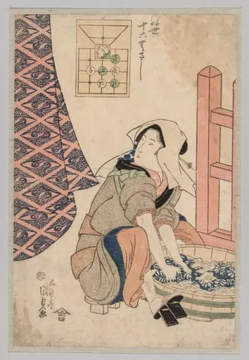 Seated Woman Washing Clothes in a Wooden Tub