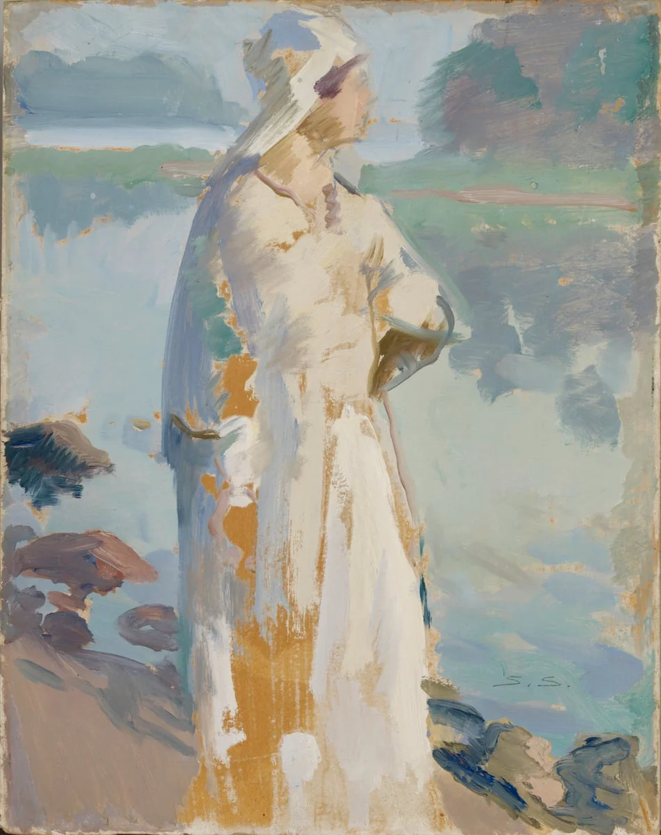 Nainen rannalla