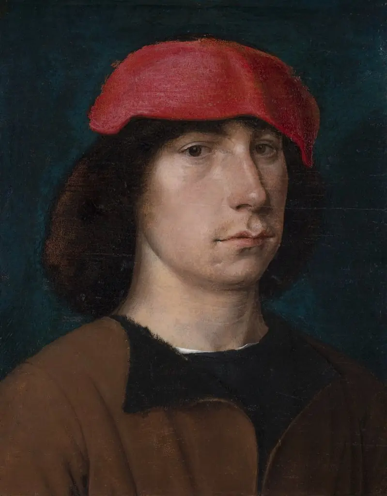 A Young Man in a Red Cap