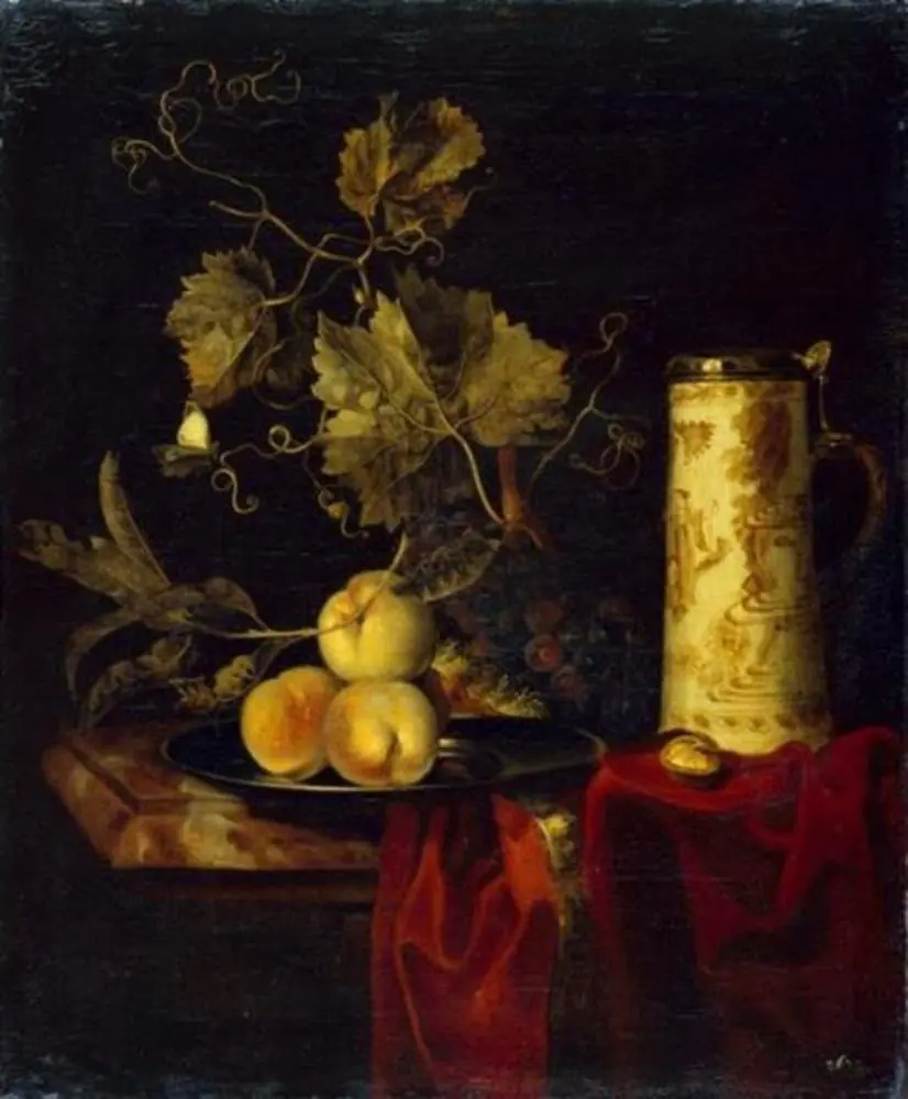 Still life with fruits and beer mug on a dark red robe