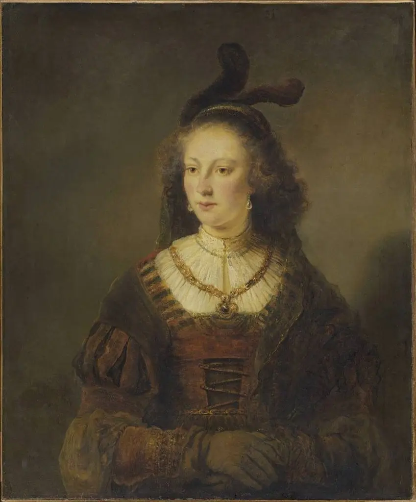 Woman wearing a feather cap and veil