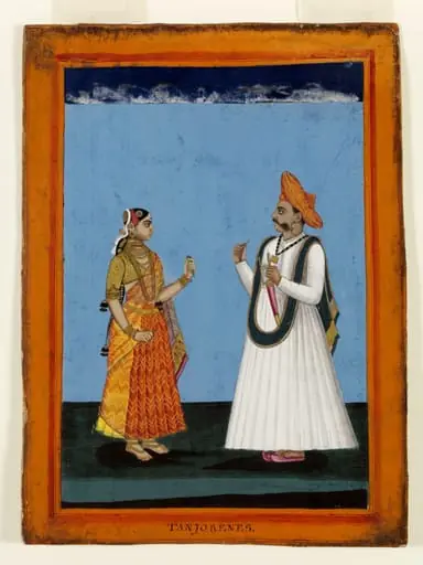 A Tanjore man in a white 'jama' holding 'pan' .