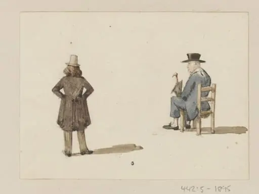 A man standing and another seated