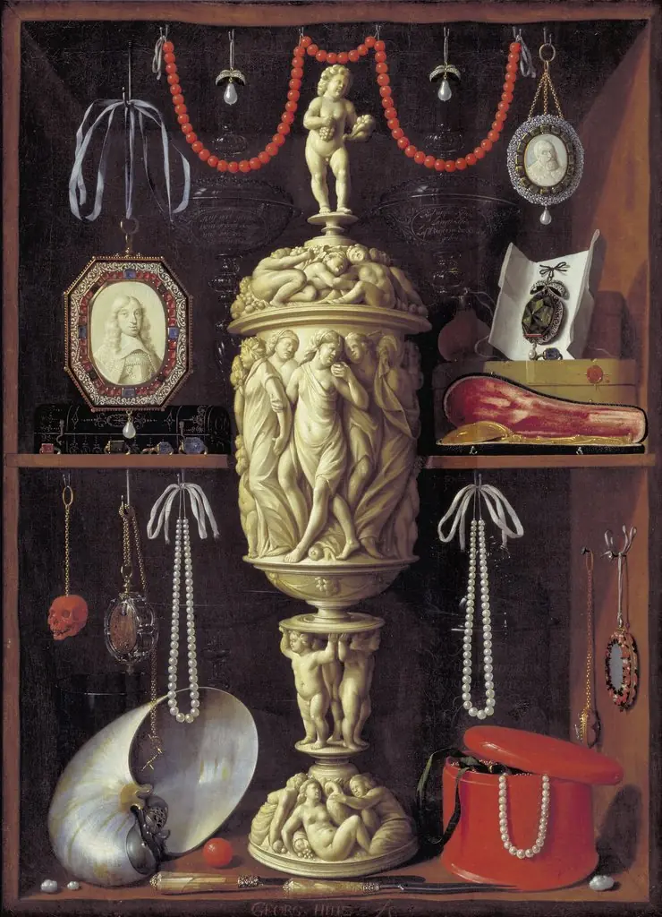 A collector's cabinet with ivory cup