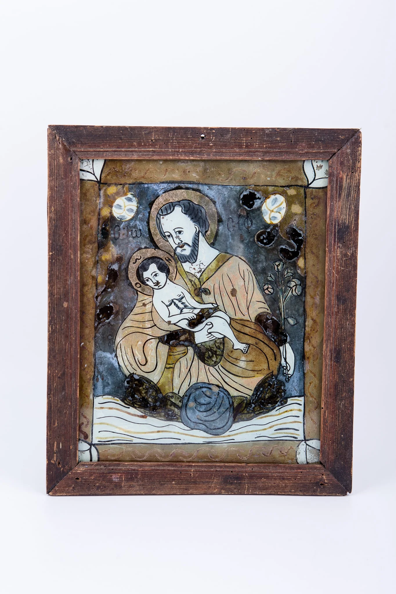 Icoana îl reprezintă pe Sfântul și Dreptul Iosif, logodnicul Sfintei Fecioare Maria, ținându-L pe Pruncul Iisus Hristos în brațe. Această tematică iconografică este mai rară, întâlnită mai mult în pictura apuseană, catolică. Sfântul Iosif este îmbrăcat în veșminte brune, bej, nisipii - culorile monahismului. Are aureolă de sfânt și în mâna stângă ține un lujer de crin înflorit, aducând aminte de BunaVestire, la care Maica Domnului a primit Crinul de la Îngerul Arhanghel Gavriil. O altă interpretare a elementului fitomorf-vegetal este vis-a-vis de ceea ce se spunea despre Sfântul Iosif, în vârstă logodnic, că era singurul dintre văduvi din Israel, al cărui baston înflorea, arătându-l vrednic de fericita Logodnă cu Sfânta Fecioară Maria. Pruncul Iisus Hristos este dezbrăcat ca un prunc și ține în mânuțe un hrisov înfășurat. Tematica este încadrată de un chenar decorativ geometrizant, format din elemente fitomorfe. Cromatica este armonioasă, dar săracă în nuanțe, predominând culoriile pământii: brun, maro, gri, negru, indigo, bej, kaki, alb. Albul Trupului pruncului Iisus Hristos se leagă armonios semantic, artistic și teologic cu Crinul Fecioriei, sau bastonul văduviei drepte mereu înflorit duhovnicește. Icoana este de Laz, Valea Sebeșului. Inscripția din româno-chirilică se traduce Iosif IC XC Iisus Hristos., by Unknown, 1850