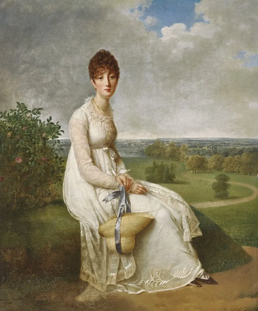 Portrait of a lady, full-length, seated on a rock in a landscape