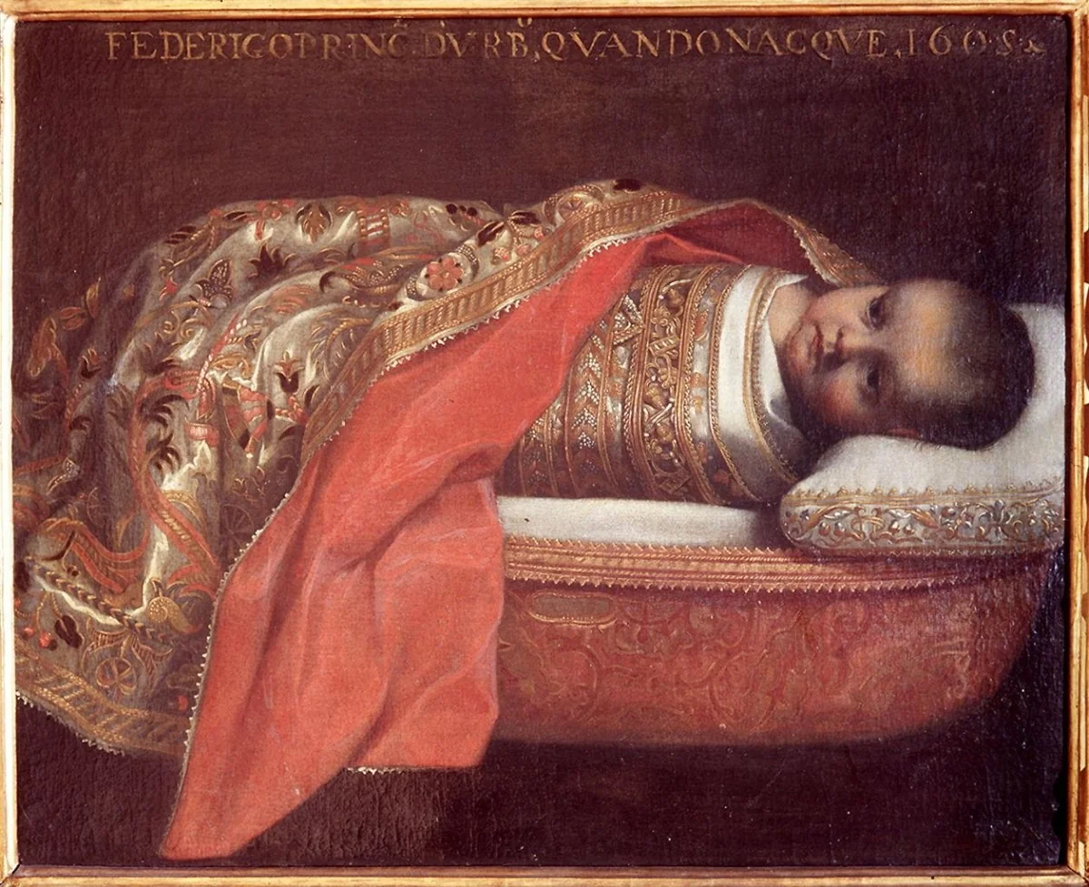 The swaddled Prince of Urbino in the cradle