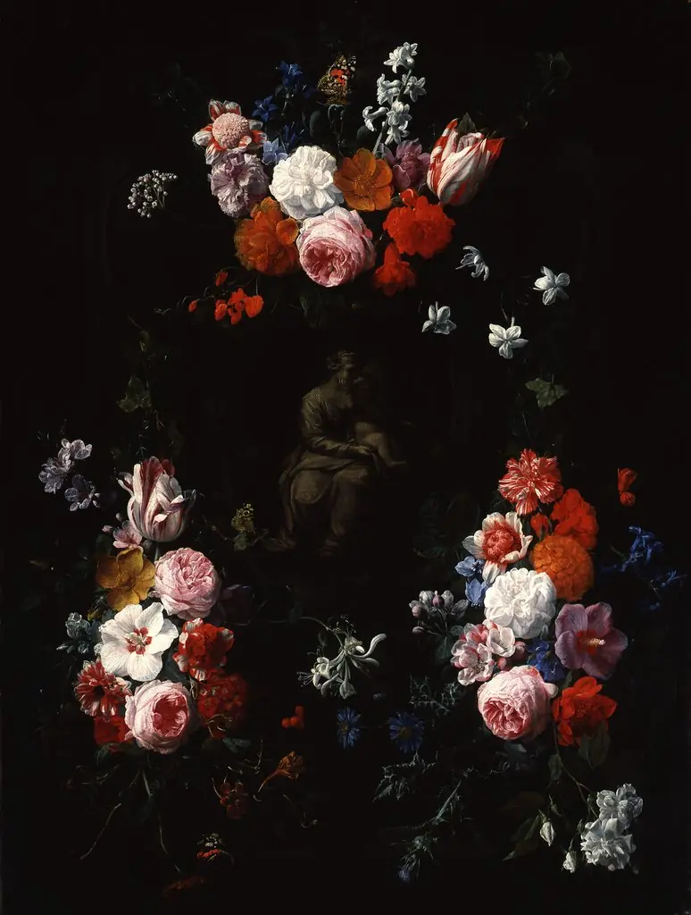 Cartouche with flowerfestoons surrounding a depiction of the Virgin mary with the Christ child