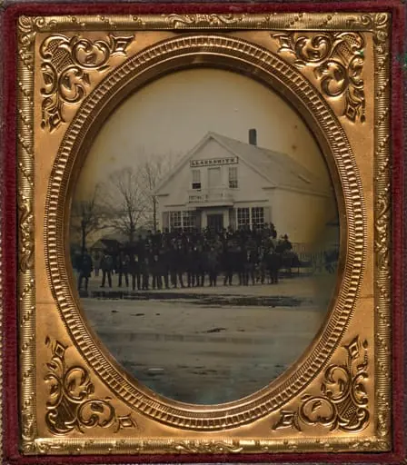 Crowd with sleigh in front of LL & ER Smith store