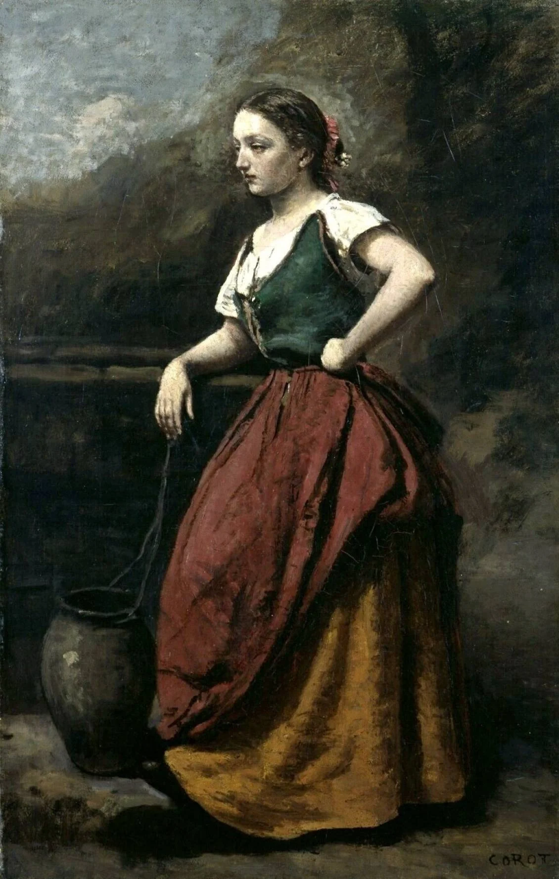 Young woman at a fountain