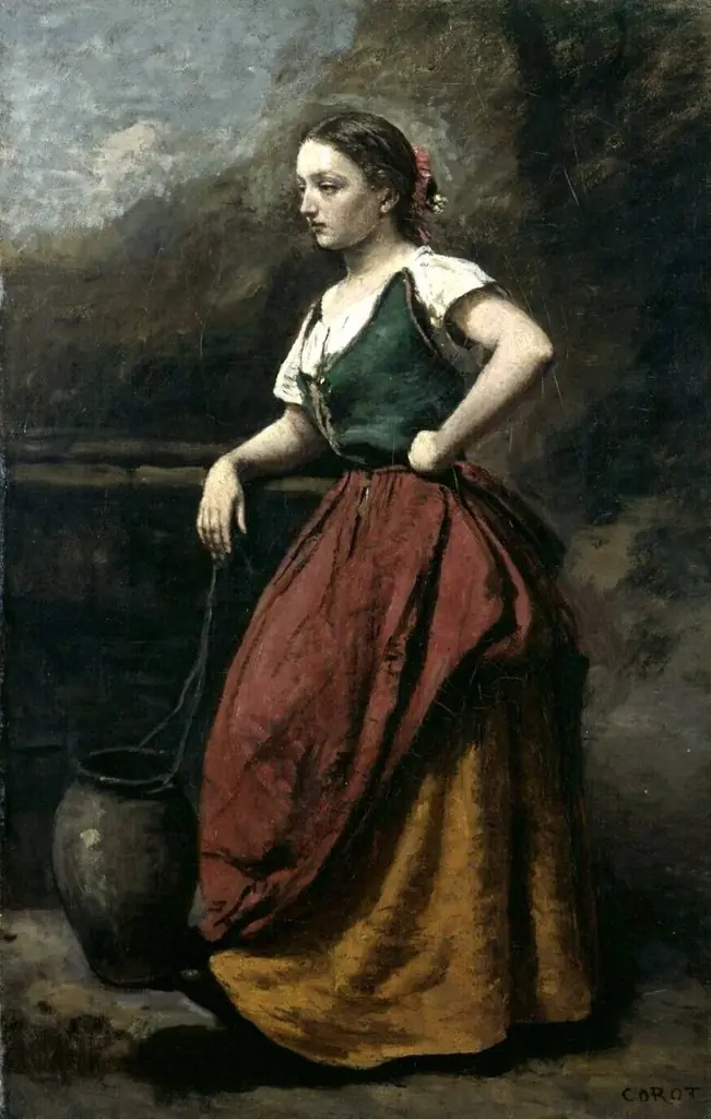 Young woman at a fountain