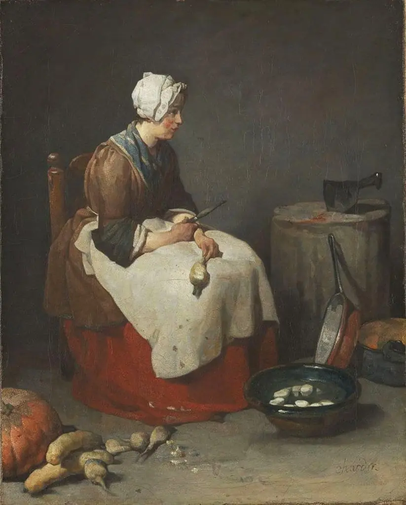 Woman peeling turnips