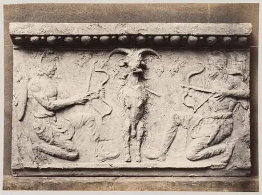 Bas-relief of a goat and two archers in terra cotta