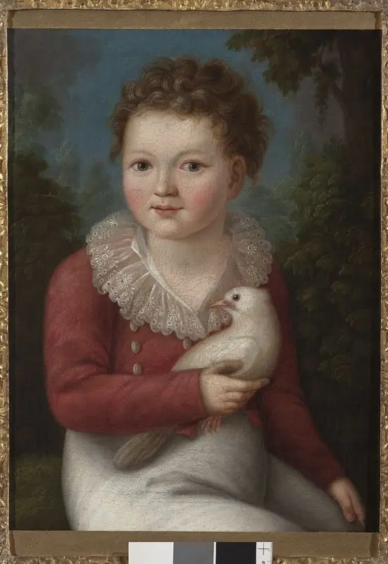 Portrait of a boy with a dove