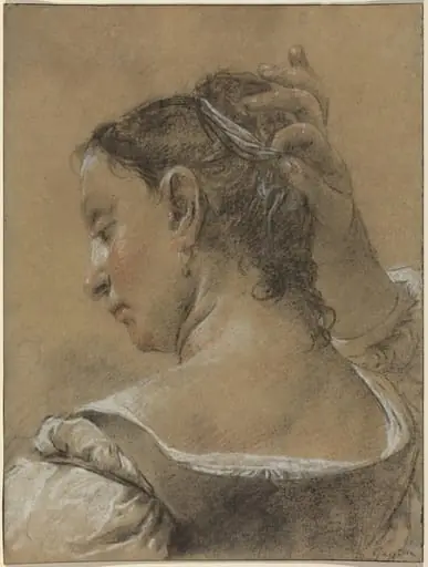 A Young Woman Fixing Her Hair