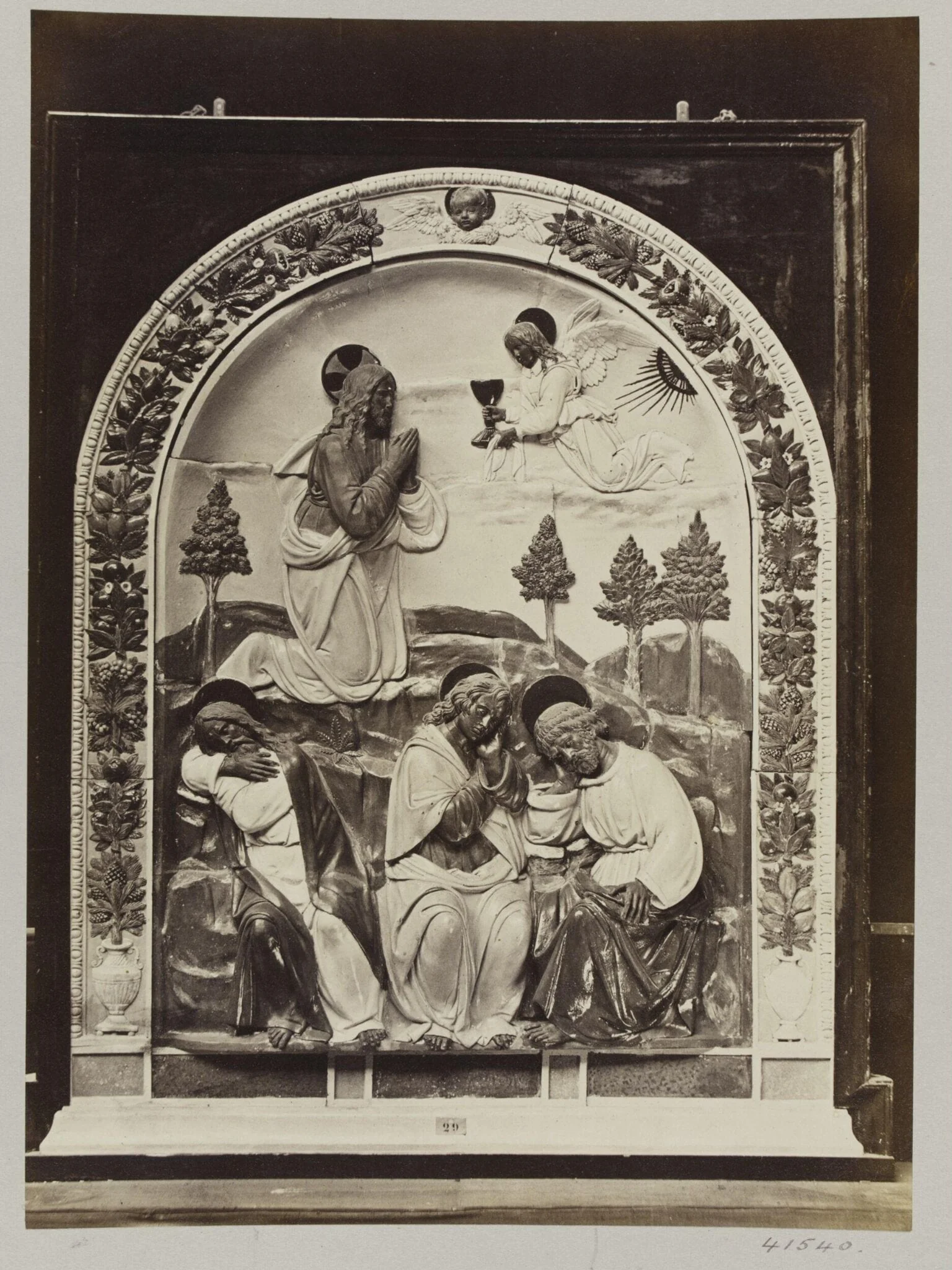 Altar piece depicting Christ in the Garden of Olives in enamelled earthenware