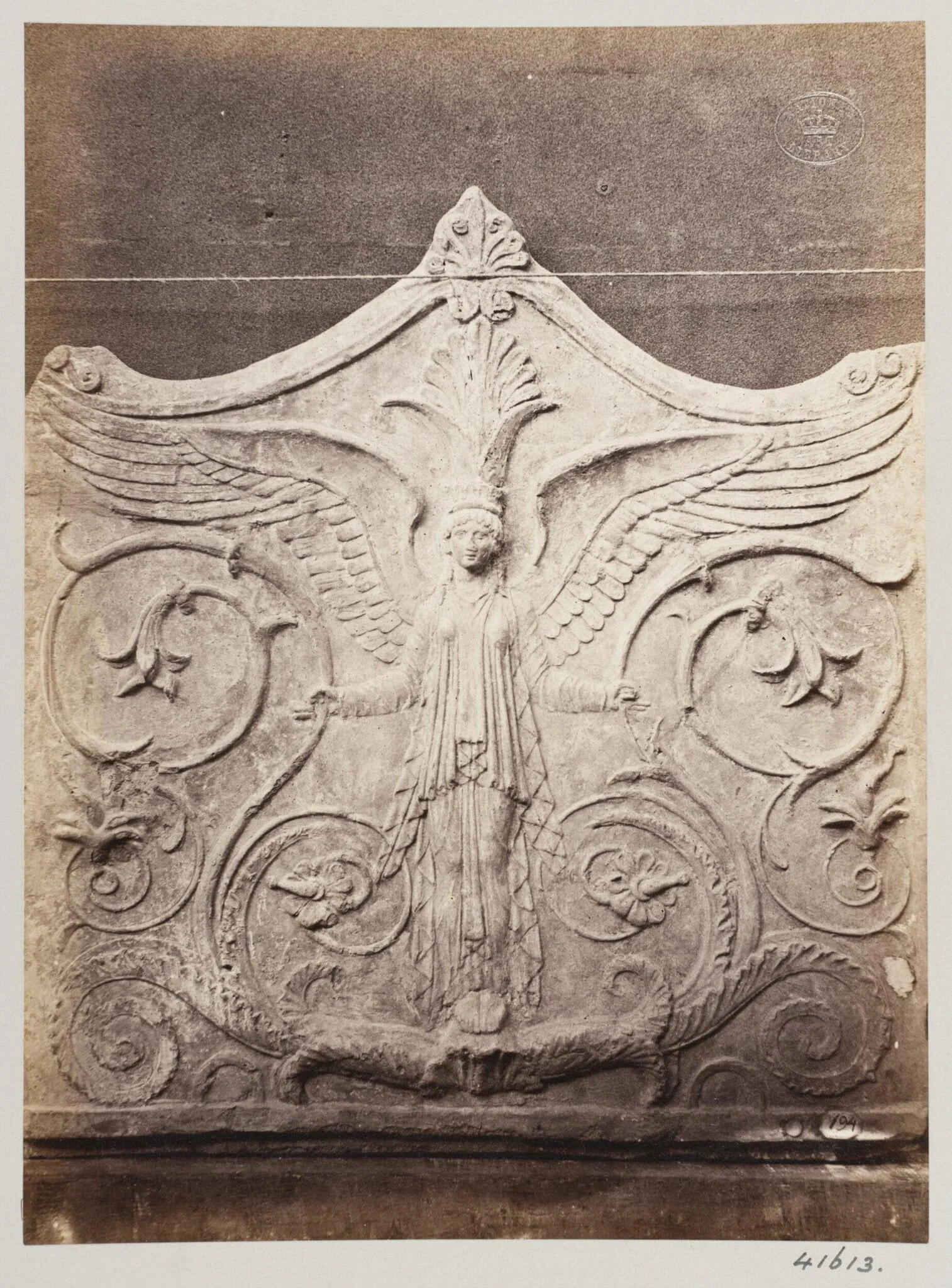 Bas-relief portion of a frieze of a winged figure with foliage in terra cotta, by Louise Laffon, photographic, 1864