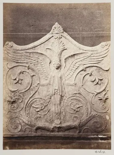 Bas-relief portion of a frieze of a winged figure with foliage in terra cotta
