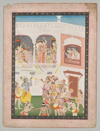 Radha and Hindu God Krishna celebrating the festival Holi