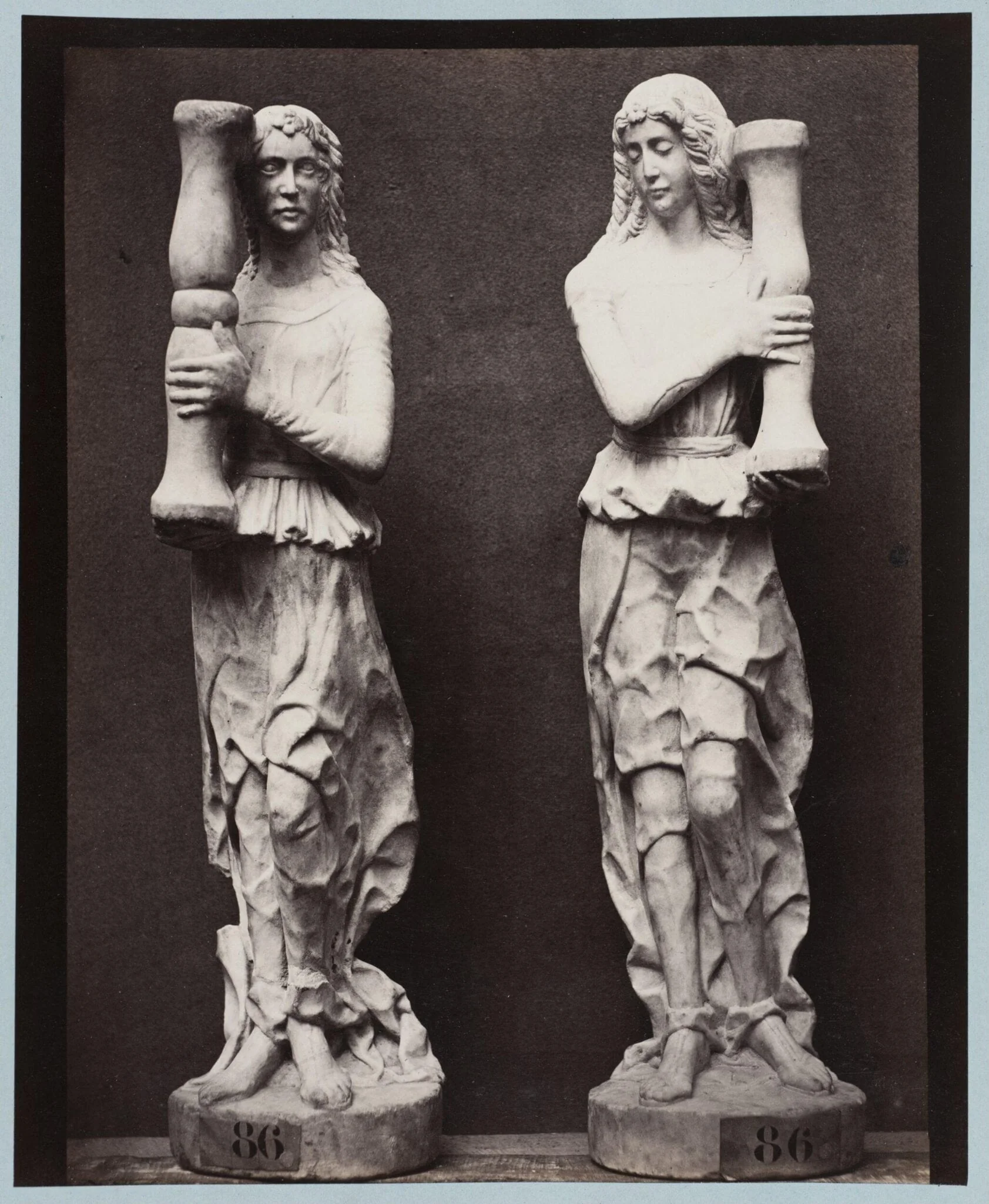 Marble statue of two angels holding torch bearers, by Louise Laffon, photographic, 1864