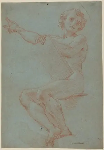 A Seated Man Holding a Tablet