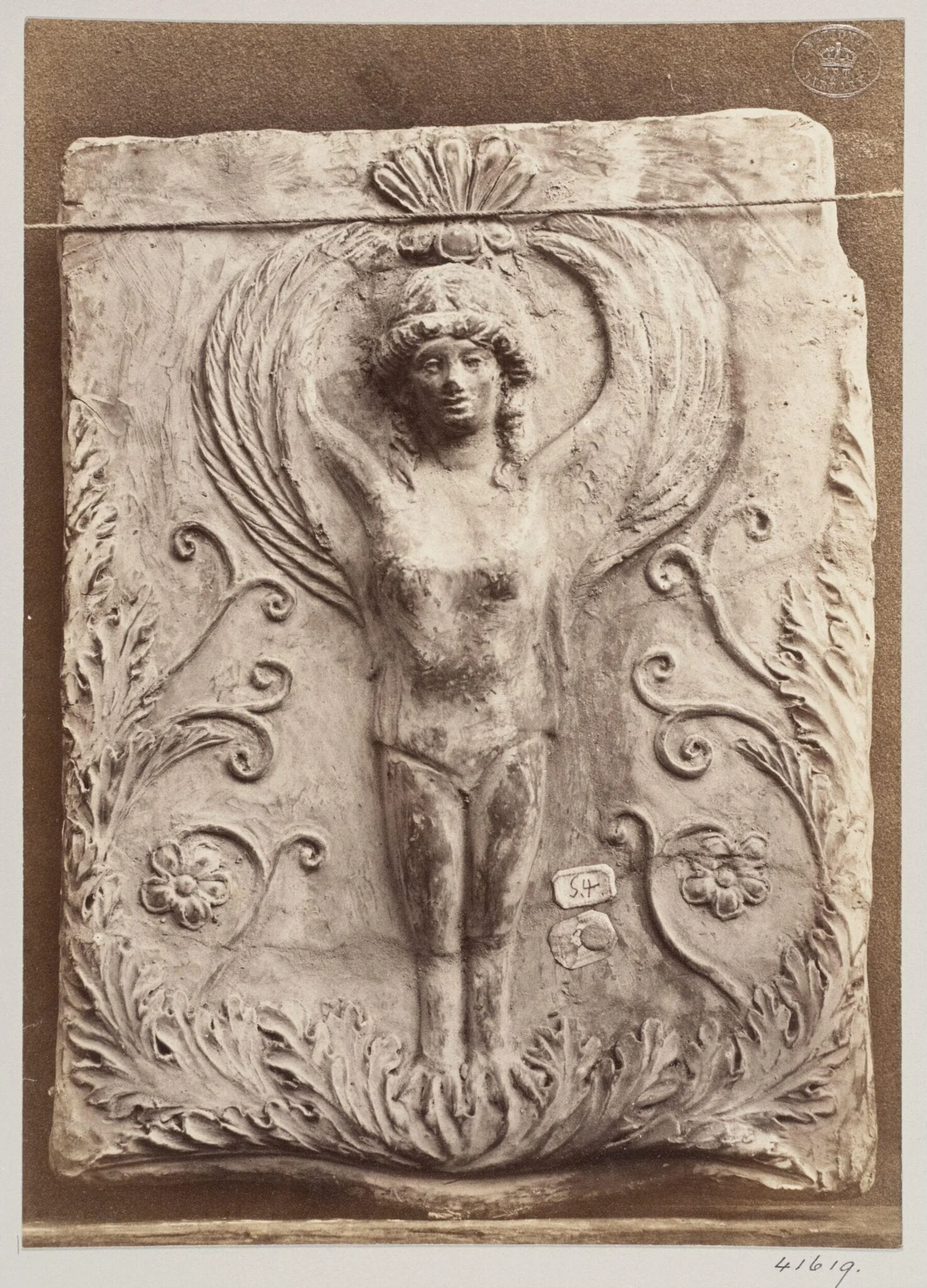 Bas-relief of a Siren in terra cotta