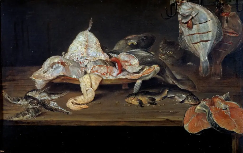 Still life with fish and a cat behind the table