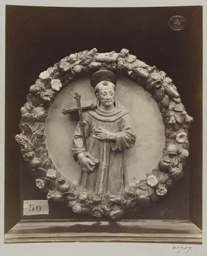 Enamelled bas-relief earthenware medallion of Saint Francis
