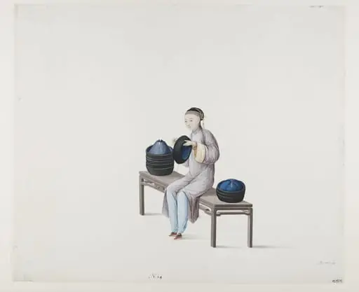Woman Making Winter Caps