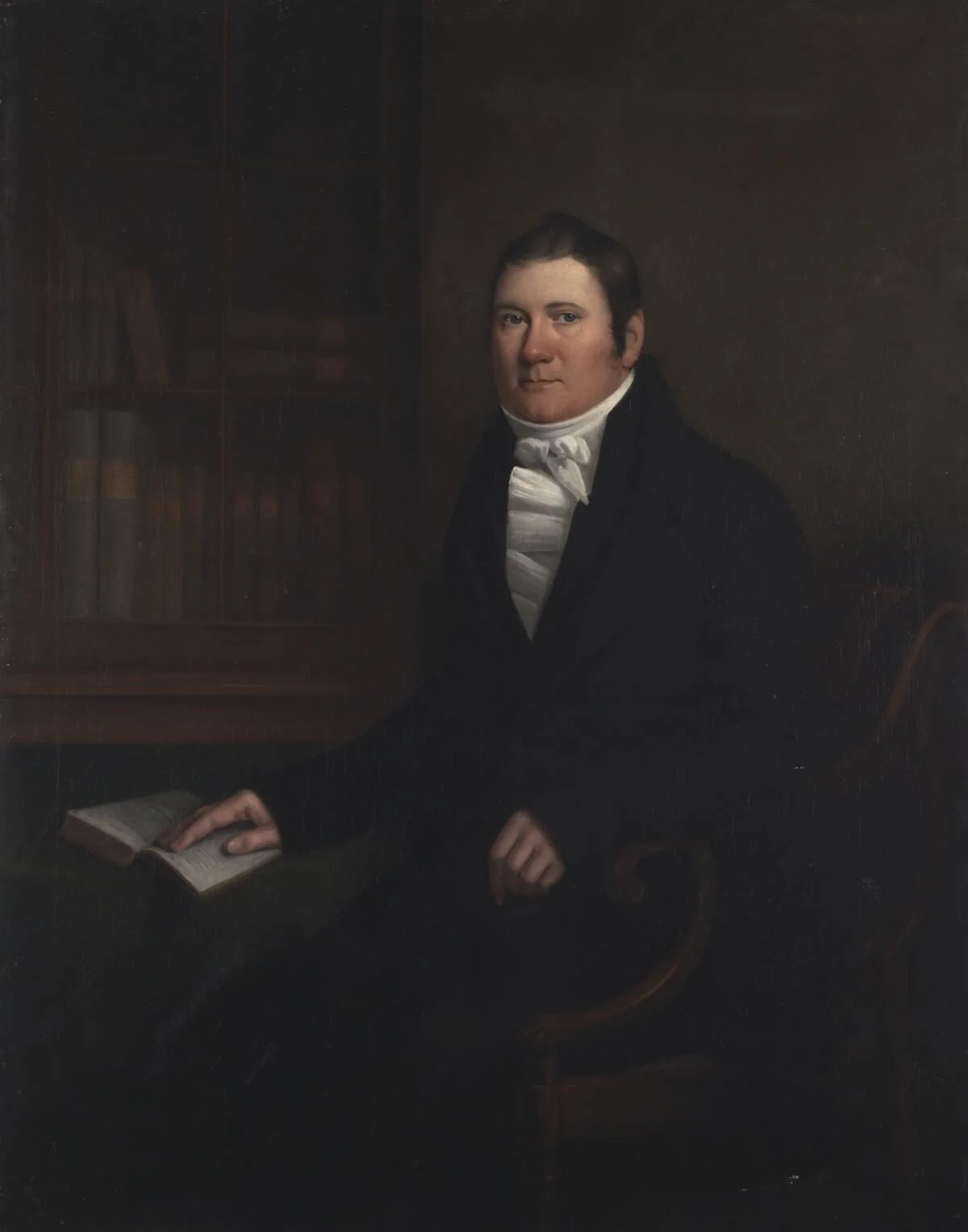 Man sitting at a table with an open book, by William Shiels, oil, 1830