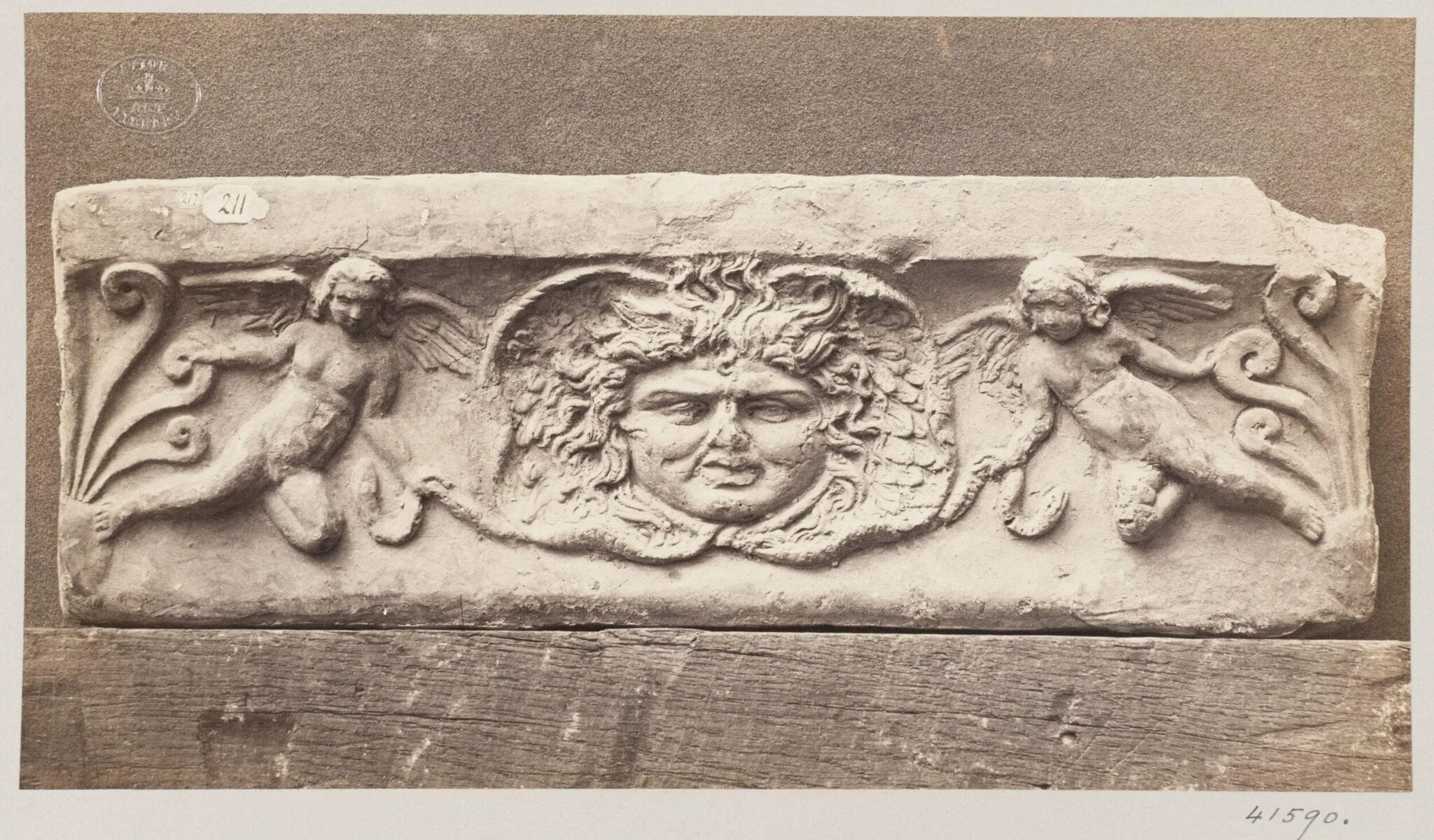 Bas-relief depicting a Gorgon Head in terra cotta, by Louise Laffon, photographic, 1864