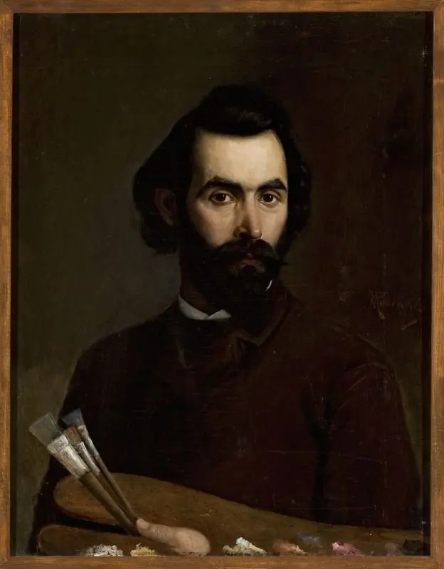 Portrait of a painter with a palette in his hand