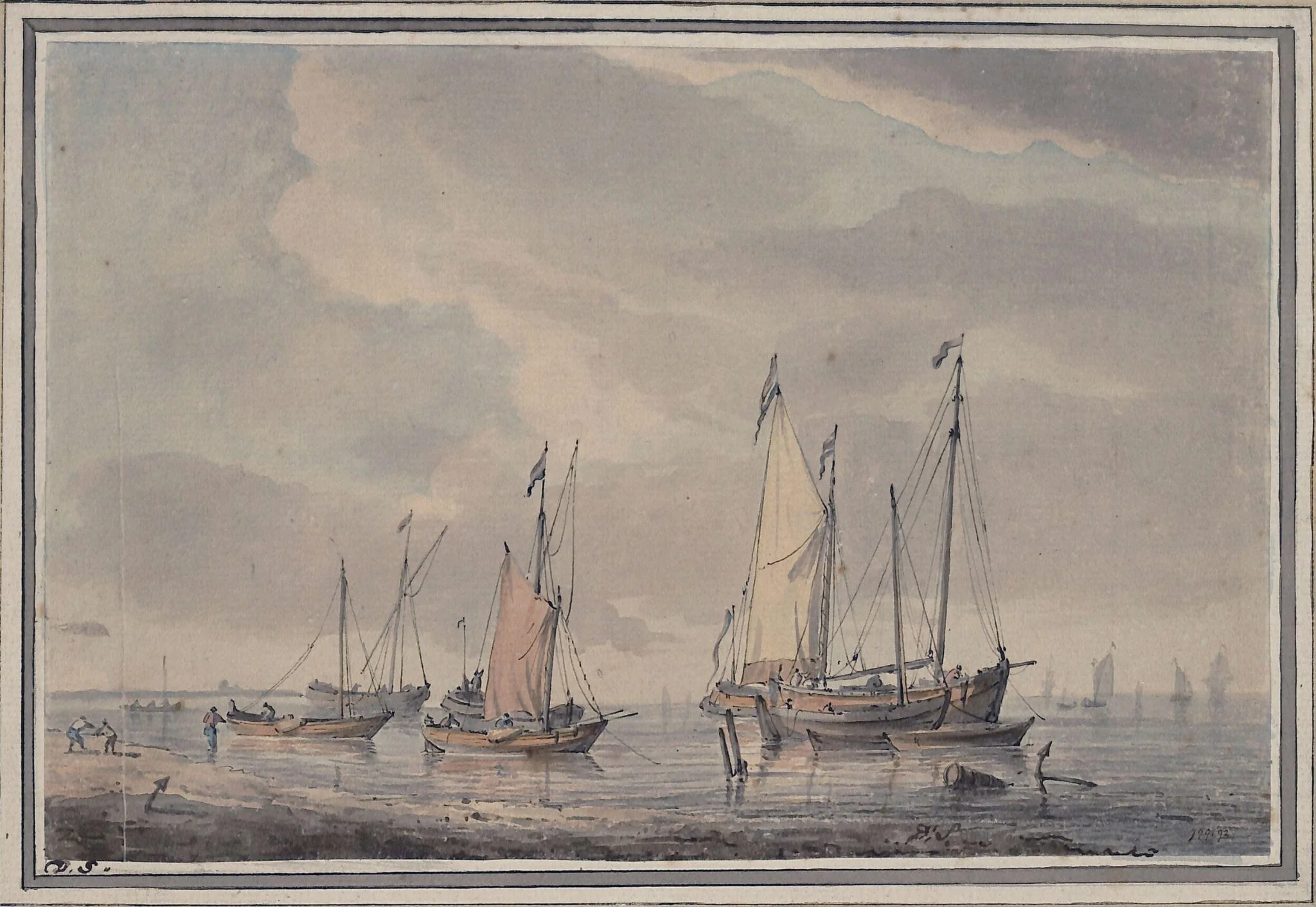Seashore with fishing vessels at anchor