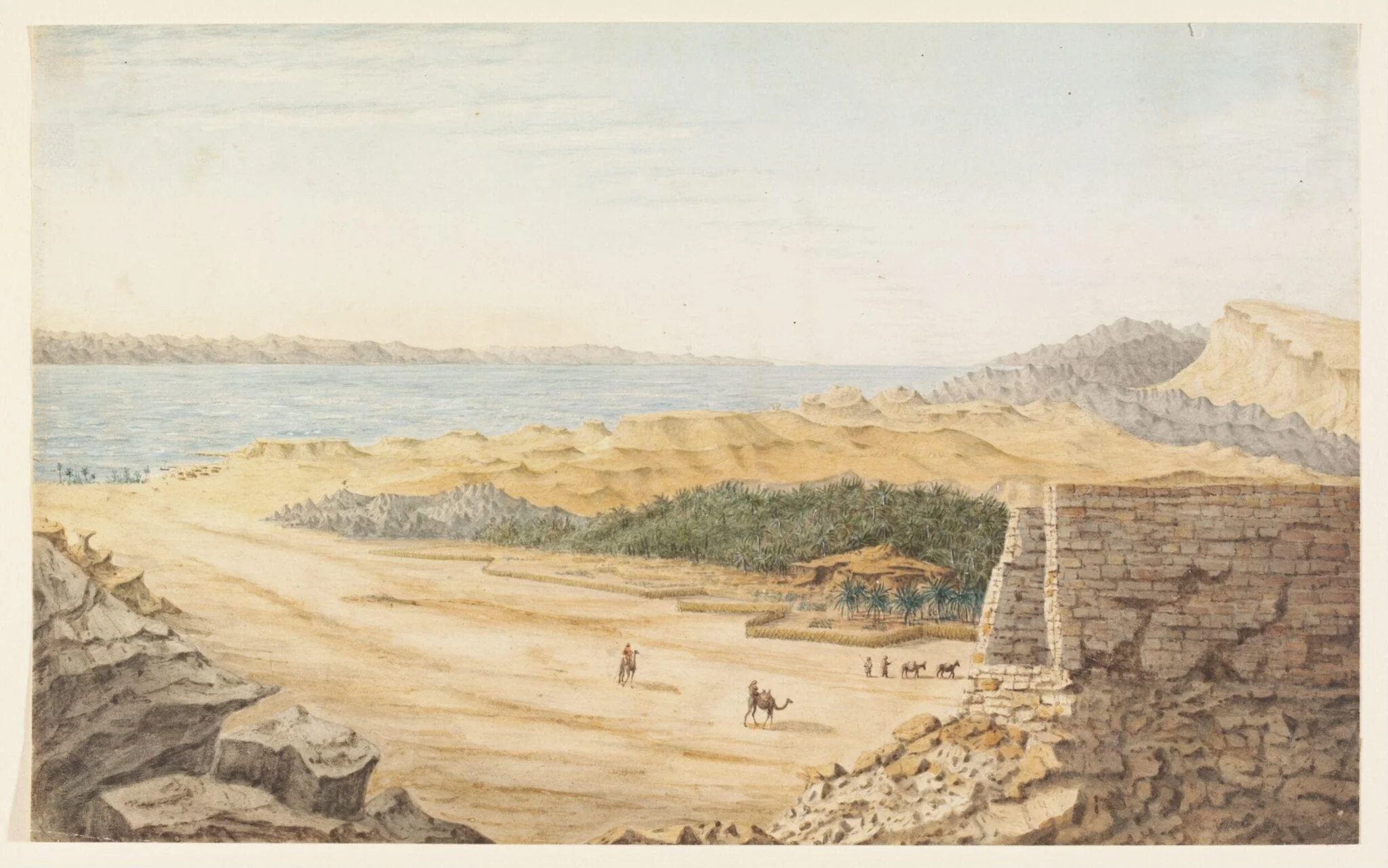 Ancient Ruins in the land of Edom above the bed of a valley and Arab Date gardens