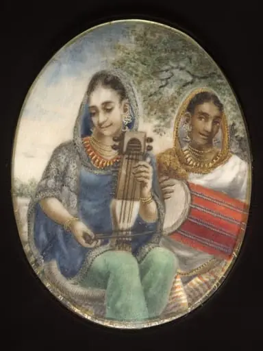 Two Indian ladies, one with a drum, the other with a sarangi.