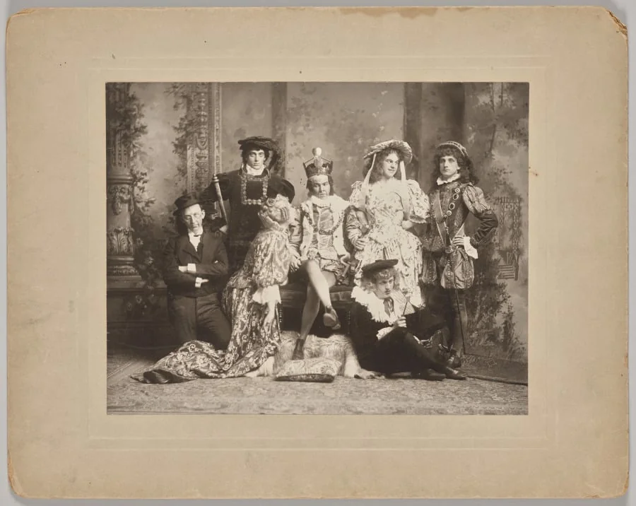 Untitled (theatrical scene with seven costumed figures)
