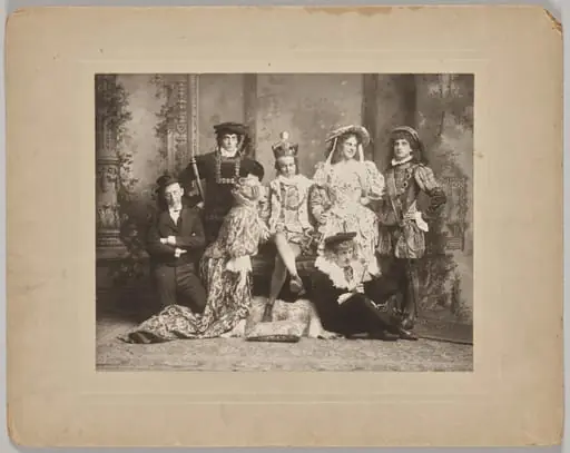 Untitled (theatrical scene with seven costumed figures)