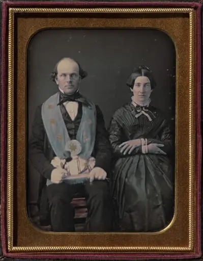 Seated Masonic lodge master and wife