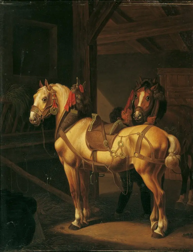 Two draft horses in the stable