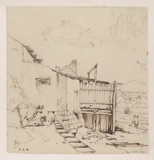 Cattle grazing by a ruinous building