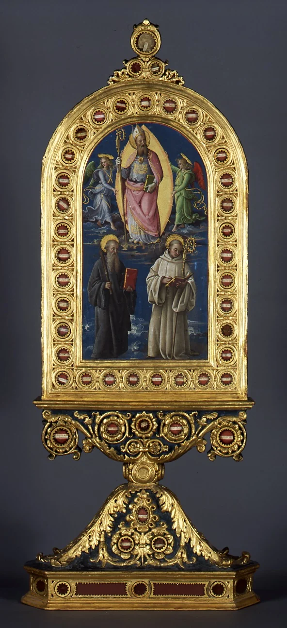 The church father Augustine in glory with two angels and the saints Benedict and Bernhard (reliquary)