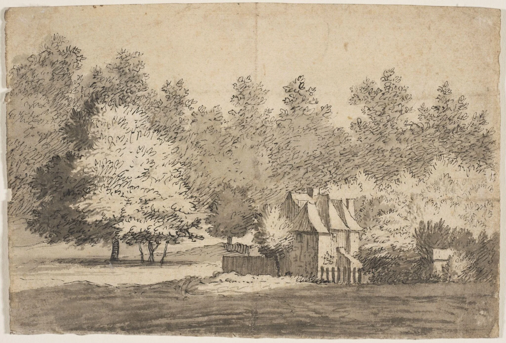 A cottage set among trees