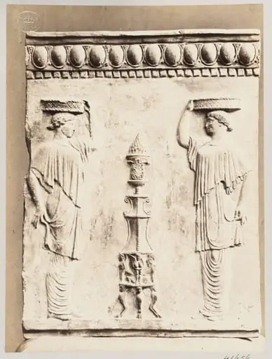 Bas-relief of a portion of a frieze with a thymiaterion and two temple slave females carrying baskets in terra cotta
