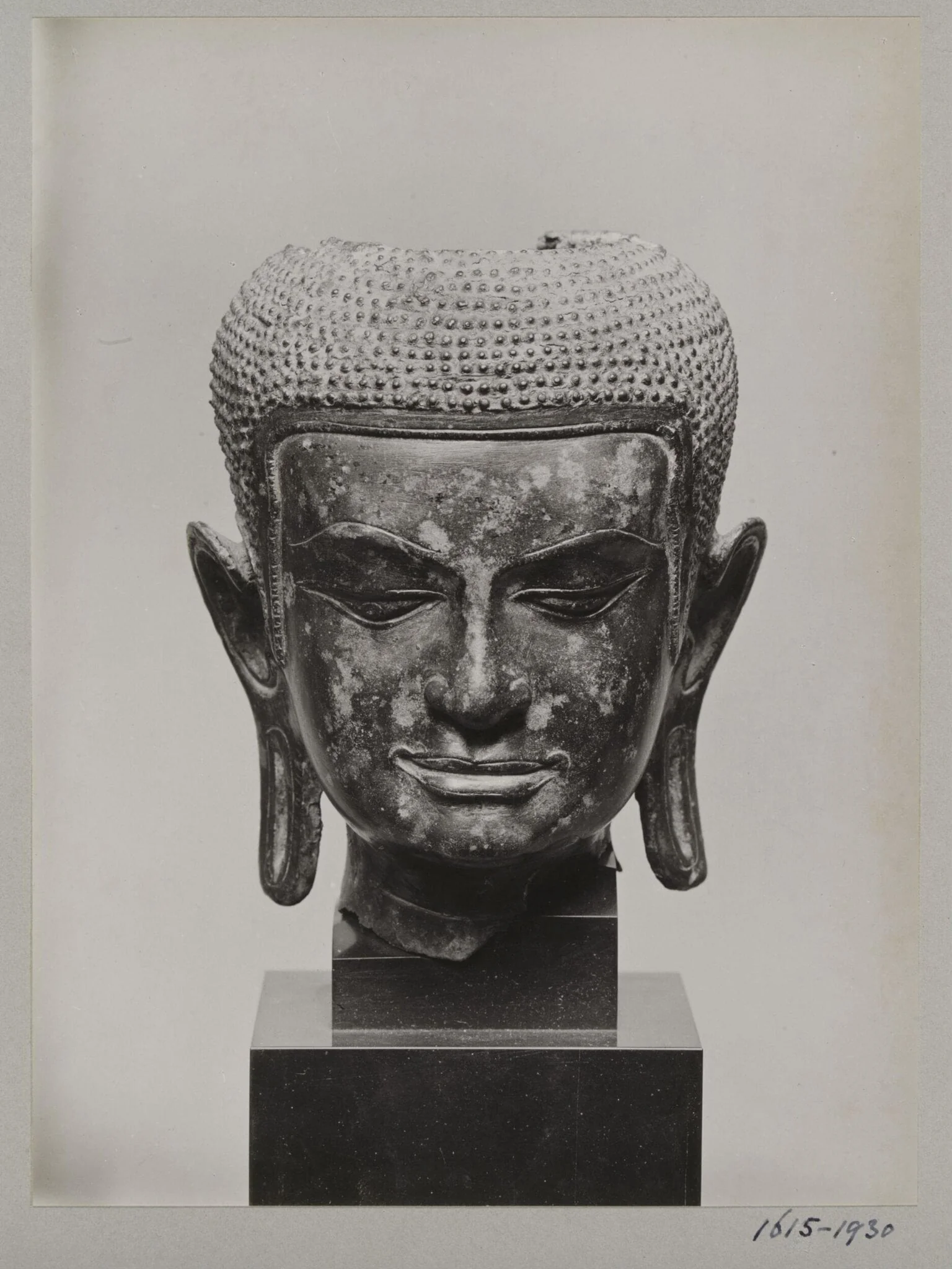 Cambodian bronze sculpture of Buddha head, ca. 13th century A.D., V&A Museum