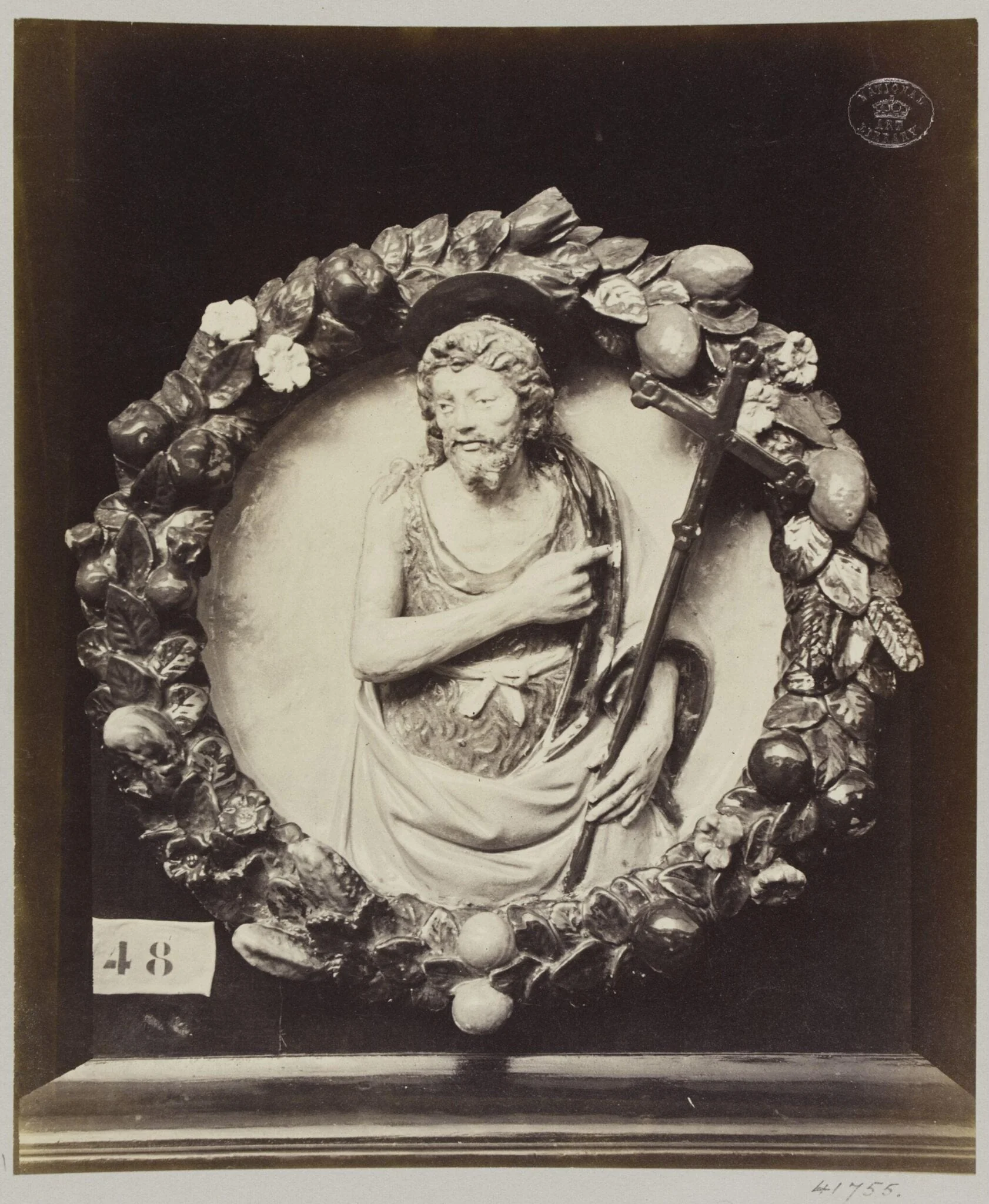 Enamelled earthenware bas-relief medallion of Saint John the Baptist