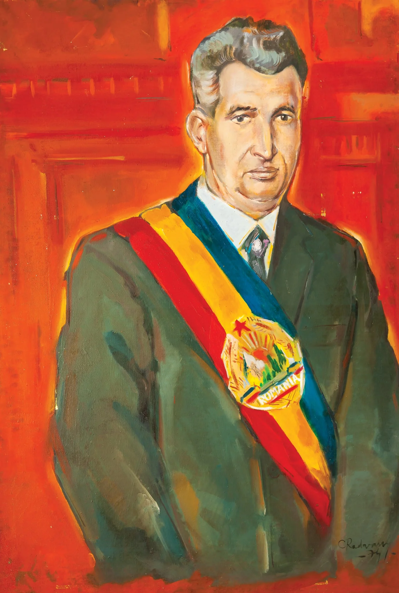Tablou, ulei pe pânză, Nicolae Ceaușescu, semnat C.Radovan și datat 1974 în partea dreaptă jos. Nicolae Ceaușescu este prezentat într-o atitudine mirat deranjată. Tablou oferit cadou lui Nicolae Ceaușescu de către autor, Ciprian Radovan, București.